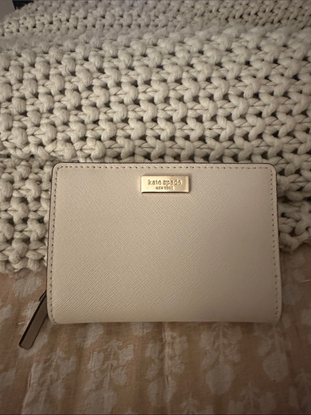 kate spade cream leather zip-around wallet with gold logo